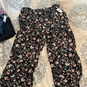 Size L, long, high waisted boot cut pants.
